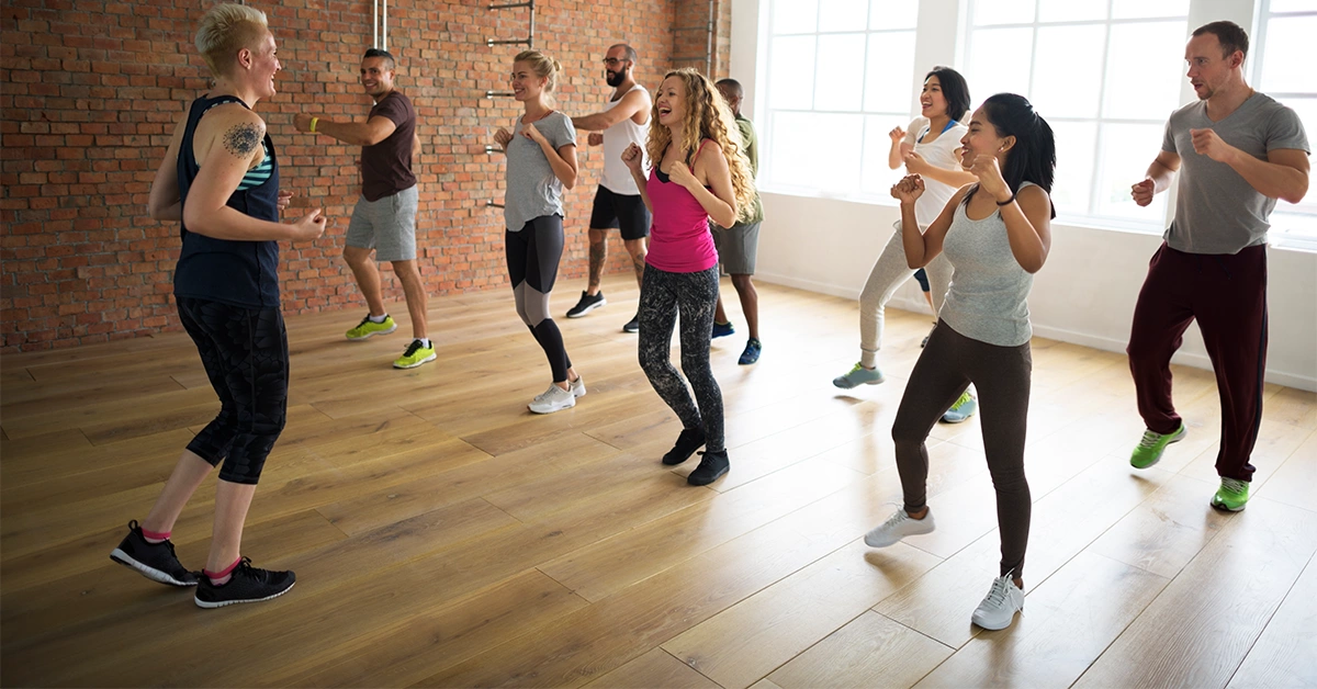 People doing Zumba and aerobics at a gym in Al Deira