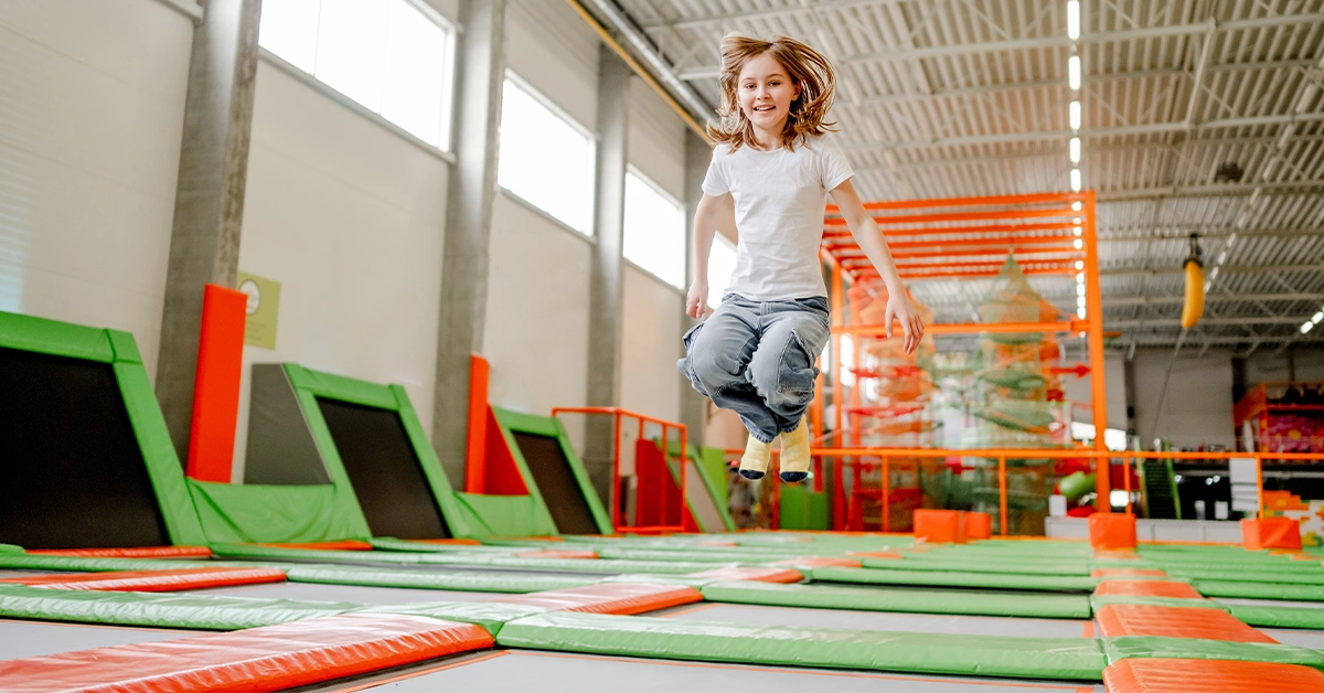 A young girl bouncing at a popular trampoline park in Abu Dhabi 
