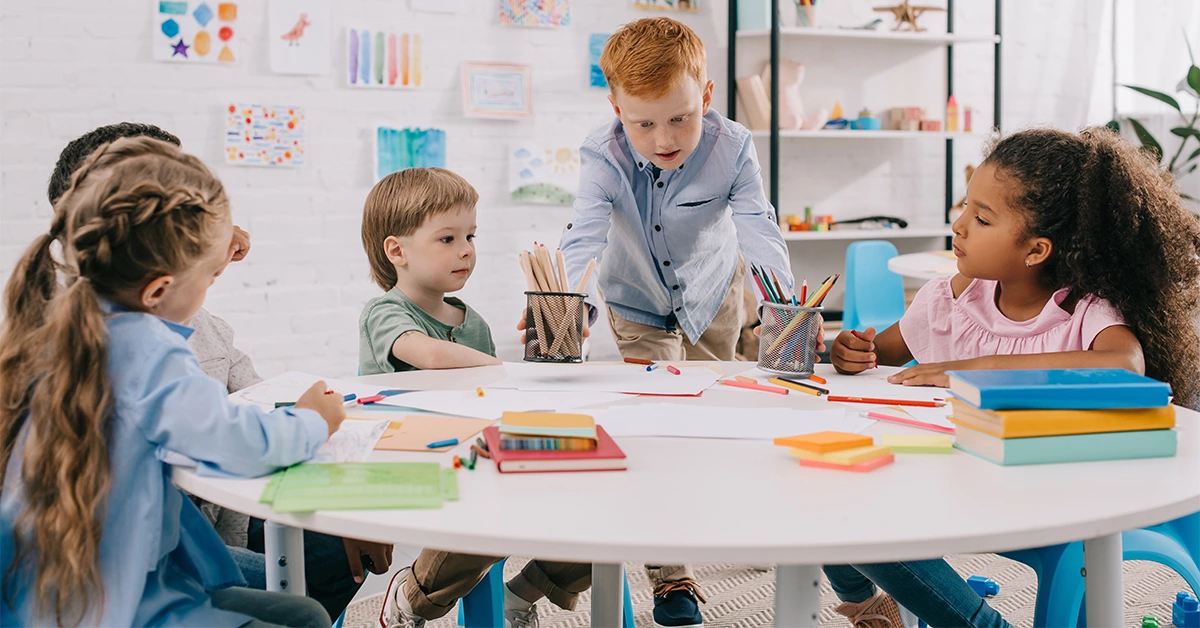 Interracial children studying together in Cambridgeshire Nursery 
