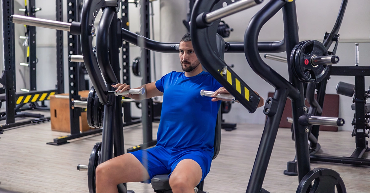 A man doing a workout at a gym in Al Deira