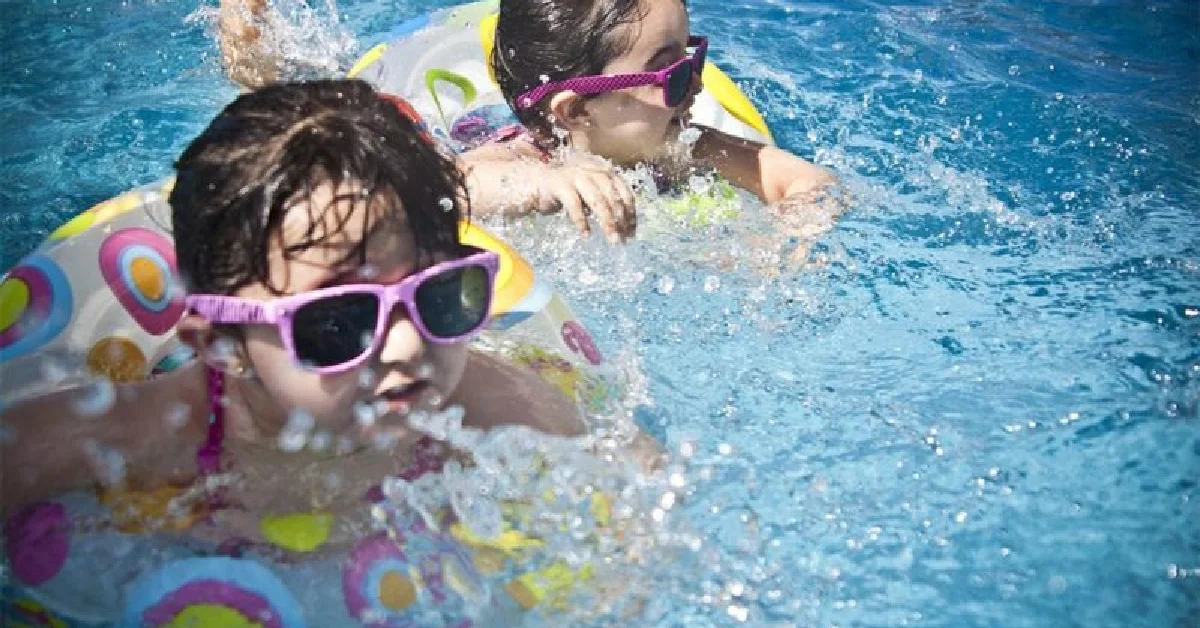 Kids enjoying water activities at summer camp in Sharjah