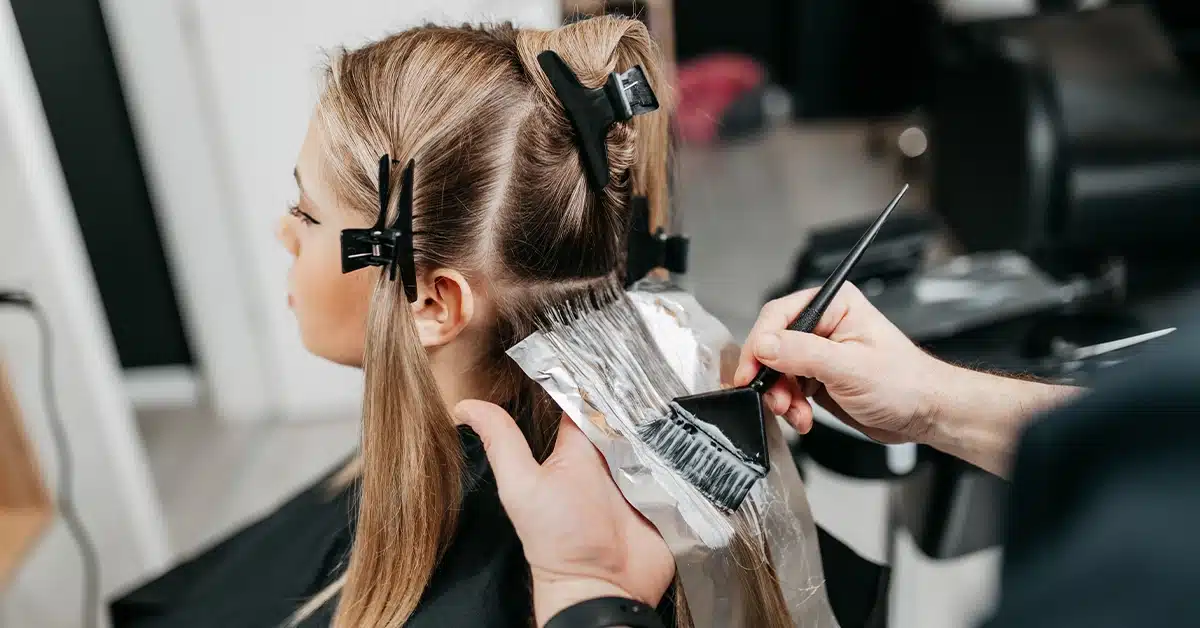 Client getting hair colour from a salon in Dubai