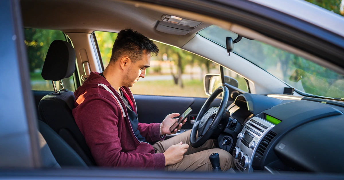 A man using Prkn app to pay the charges