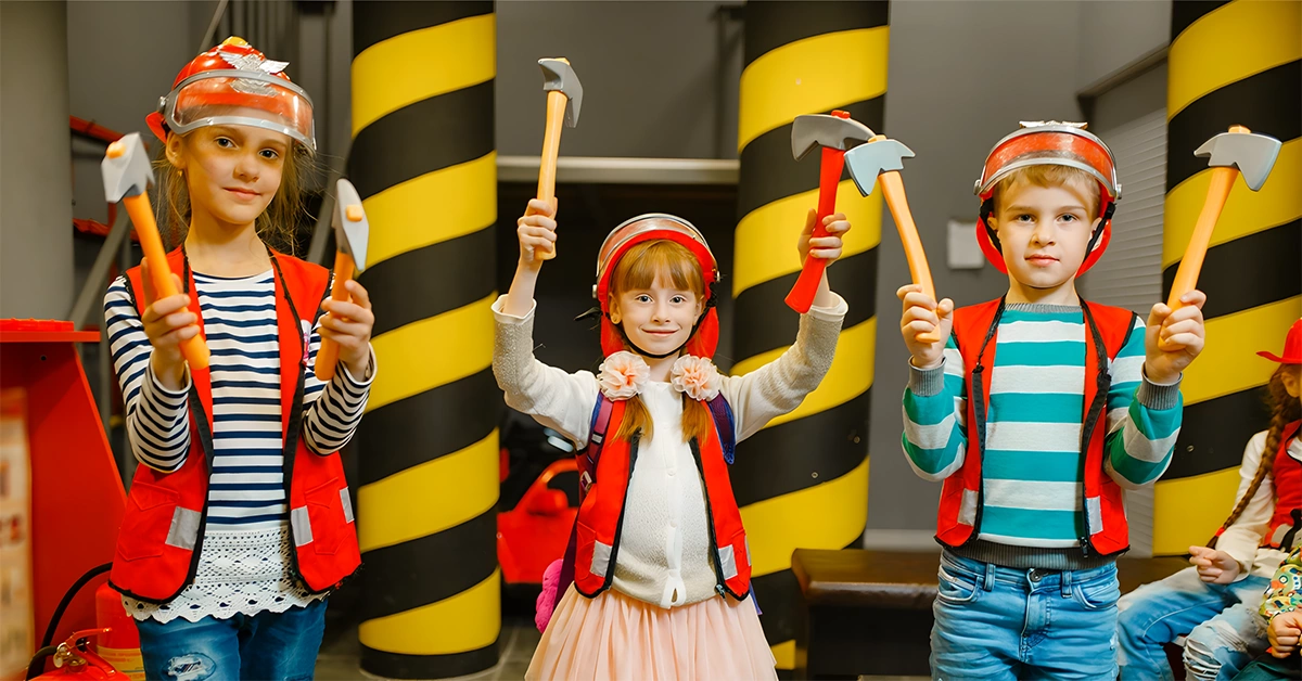 Kids playing roles as firefighters at KidZania