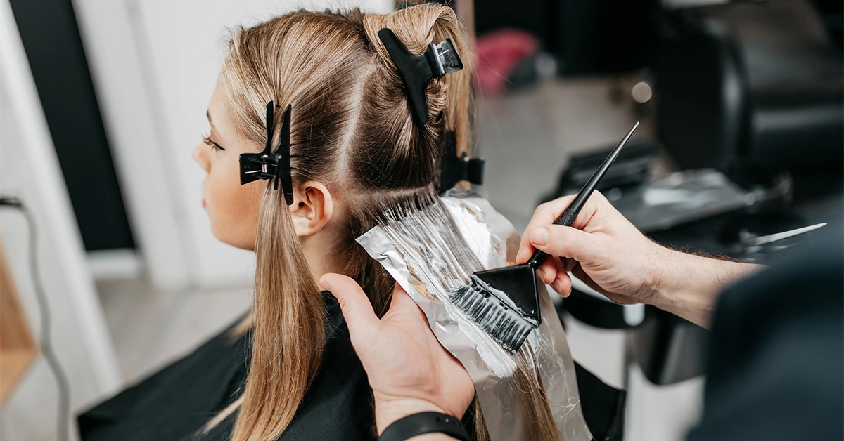 Hair colouring using quality products at a beauty salon in Dubai Silicon Oasis