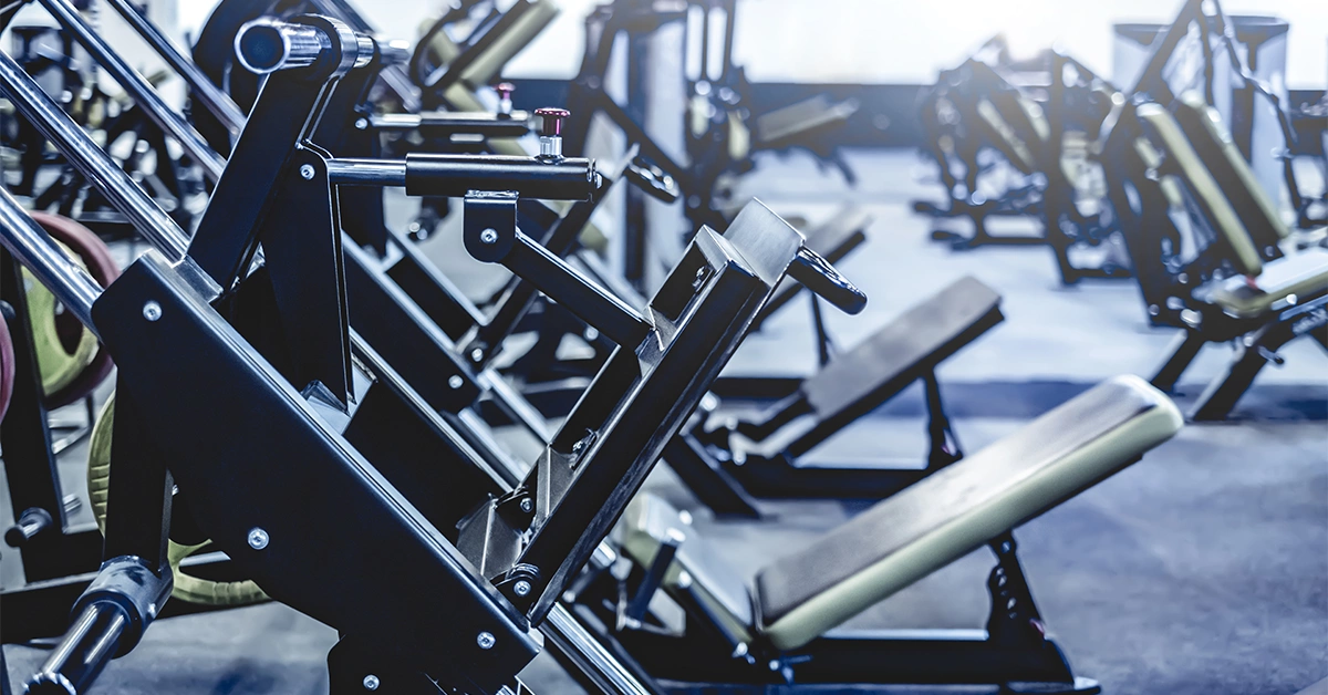 Leg trainer equipment in a gym