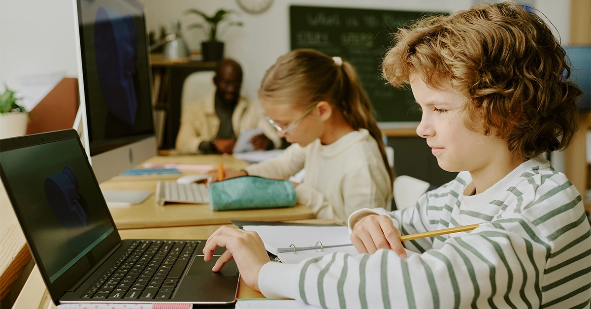 Child learning to code at Future Minds Summer Camp