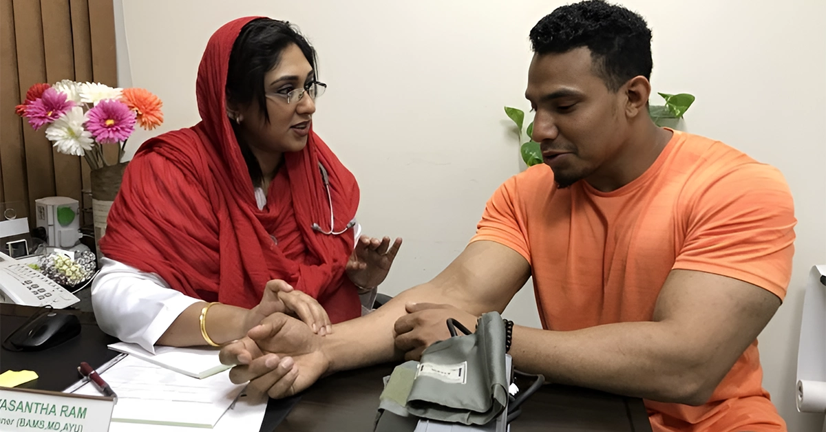 Doctor checking patient in Ayurdhara Ayurvedic Centre