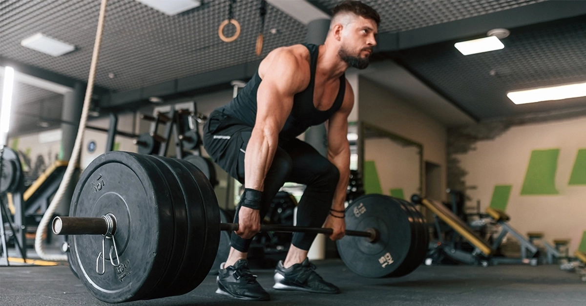 A man lifting a heavy barbell