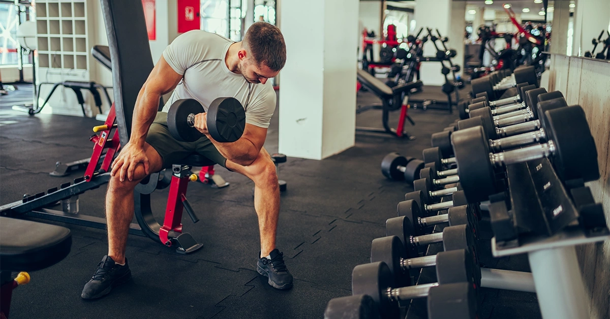 A man working out at a famous gym in Karama