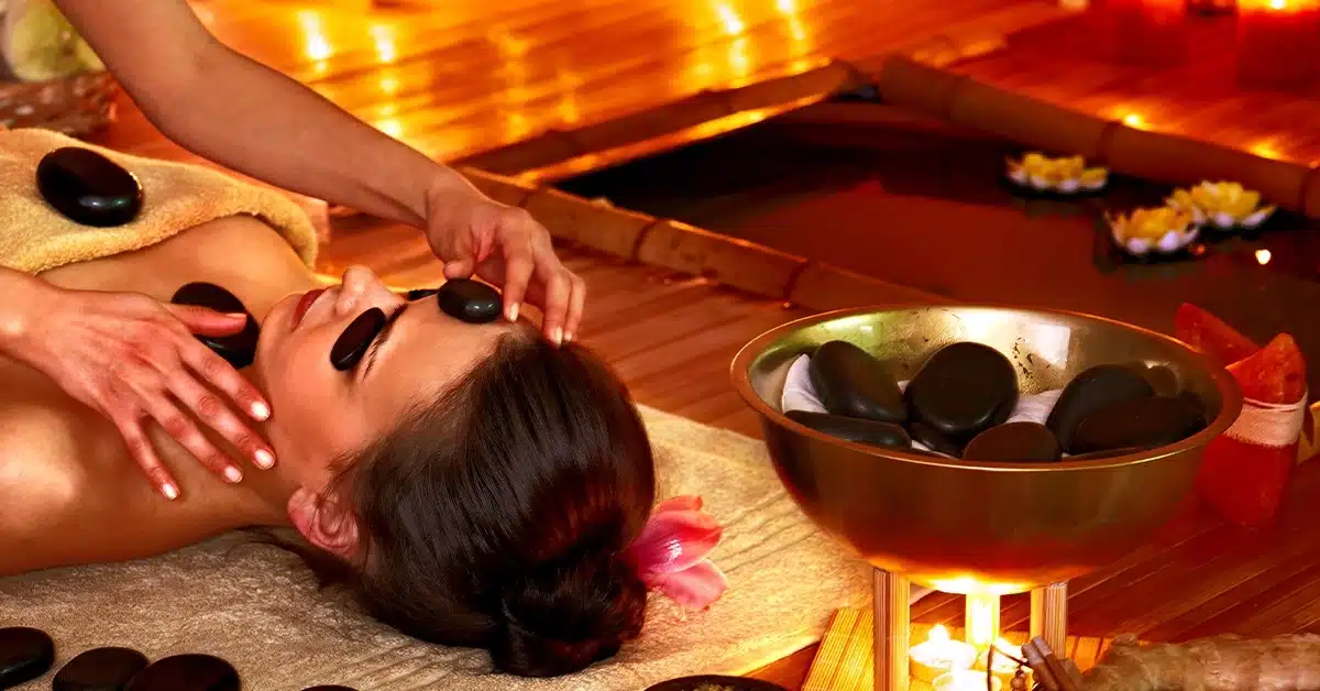 Woman getting a stone therapy massage