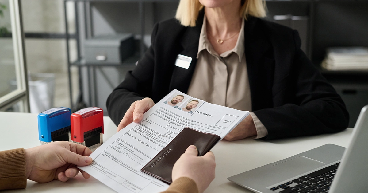 Submitting an application form with required documents for a Portugal visit visa from Dubai