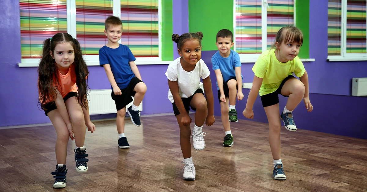 Kids learning to dance at the Infinity Ladies Health Summer Camp