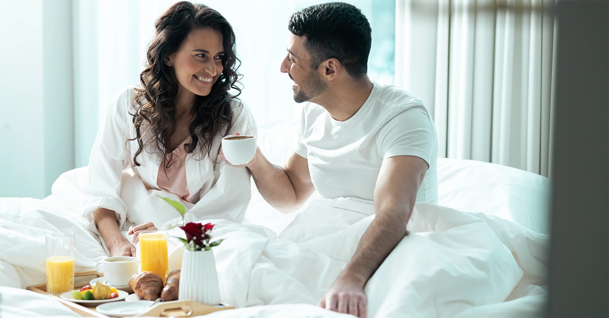 A couple enjoying a getaway at Oryx Grand Hotel