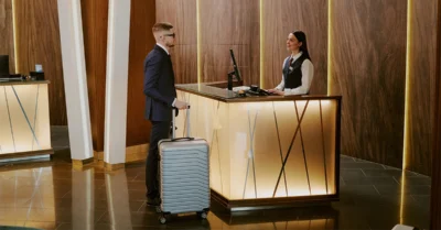 Man checking in the best hotel in Al Quoz