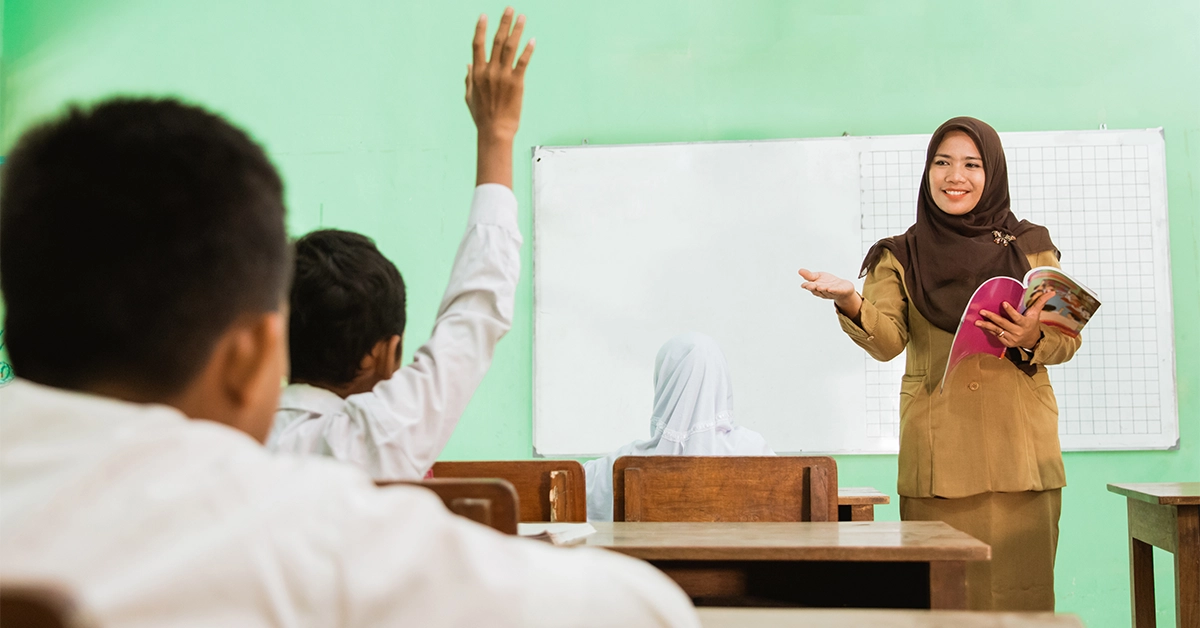 A teacher delivering a lecture at one of the top Islamic International schools in Dubai