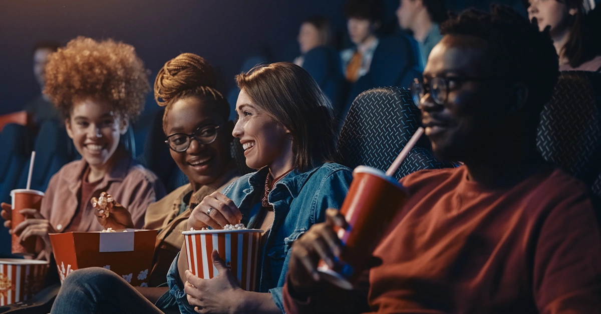 Friends enjoying a movie at Star Cinema Ajman