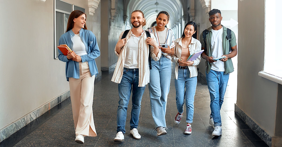 Students Walking Down the University Hallway