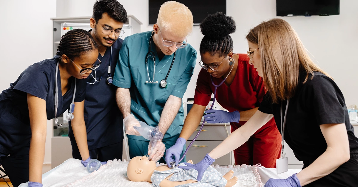 Medical students performing CPR
