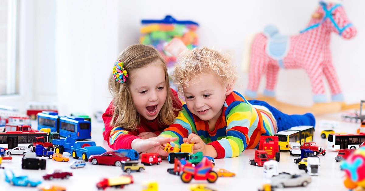 Toddlers playing with toys