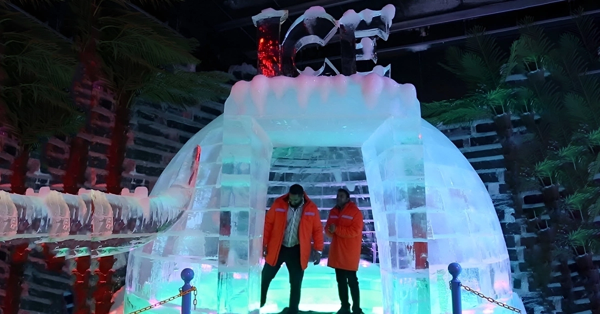 Two young men exploring Dubai Ice Park