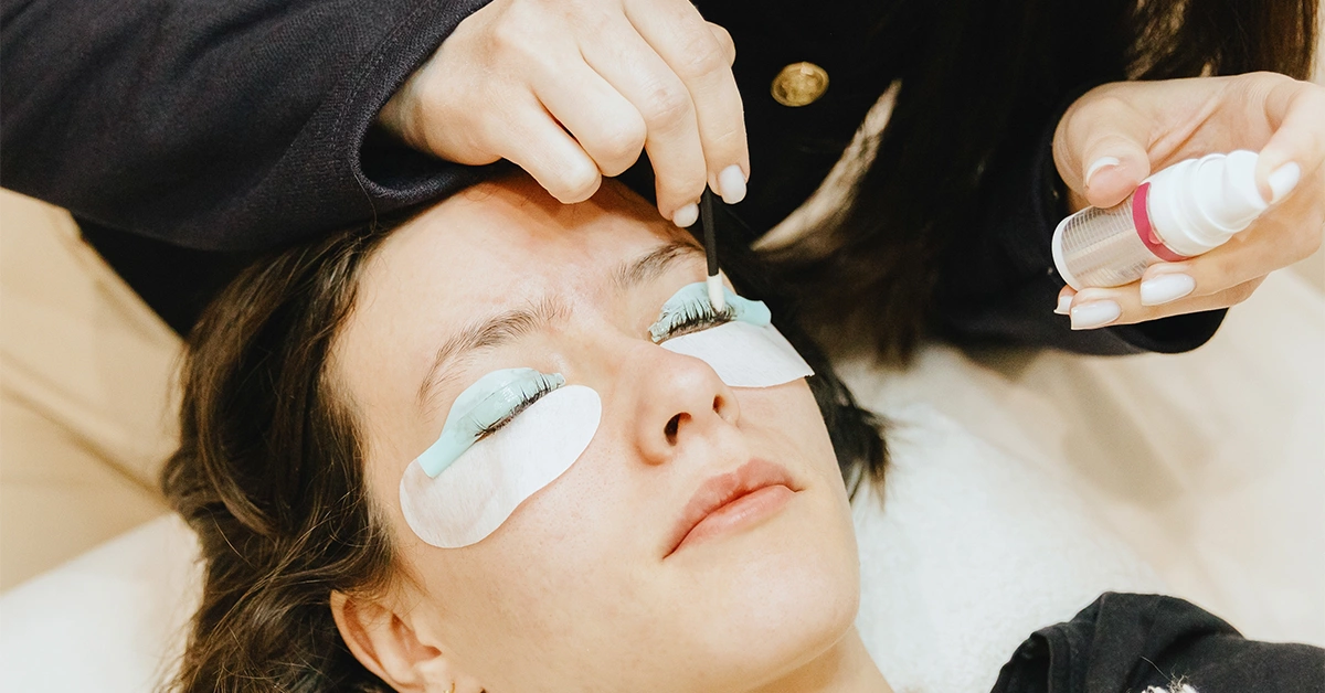 A client enjoying a facial right from the comfort of her home 