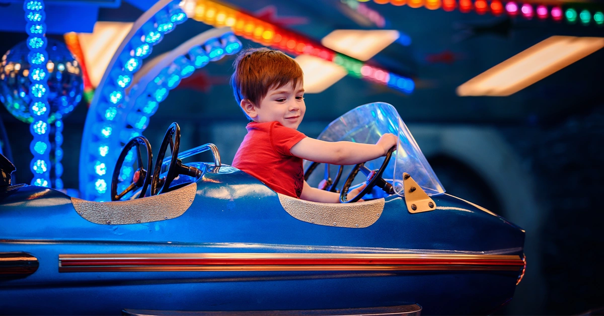 Kid enjoying his ride at Fun City