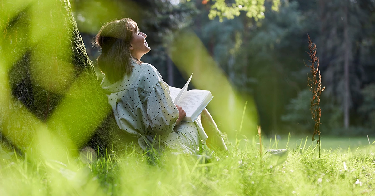 A woman reading in a park