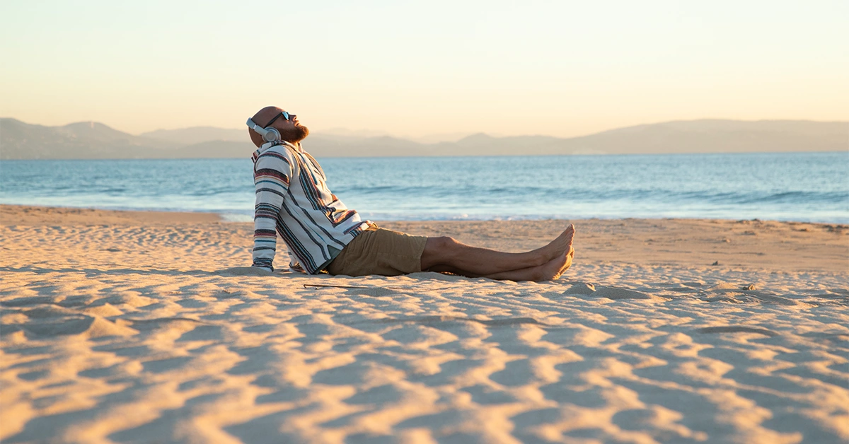 A man relaxing at Sambraid Beach