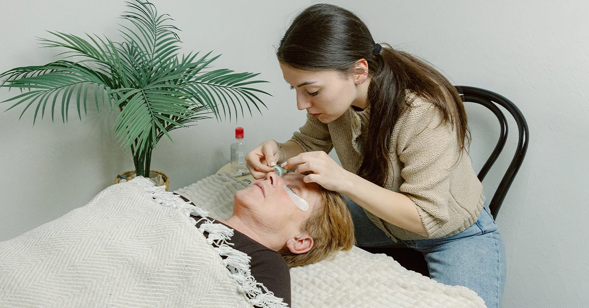 A stylist providing facial home services in Abu Dhabi