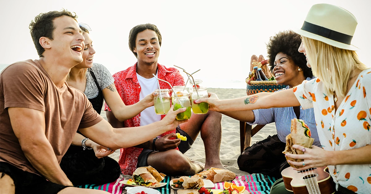 A group of friends having a picnic at Sambraid Beach