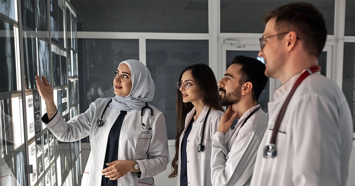 A group of junior doctors discussing a case at one of the medical universities in the UAE
