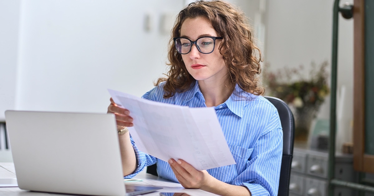 A woman choosing the best expat medical insurance in the UAE