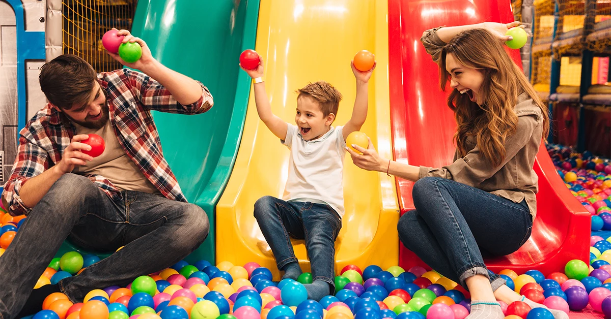 Parents enjoying with their little one