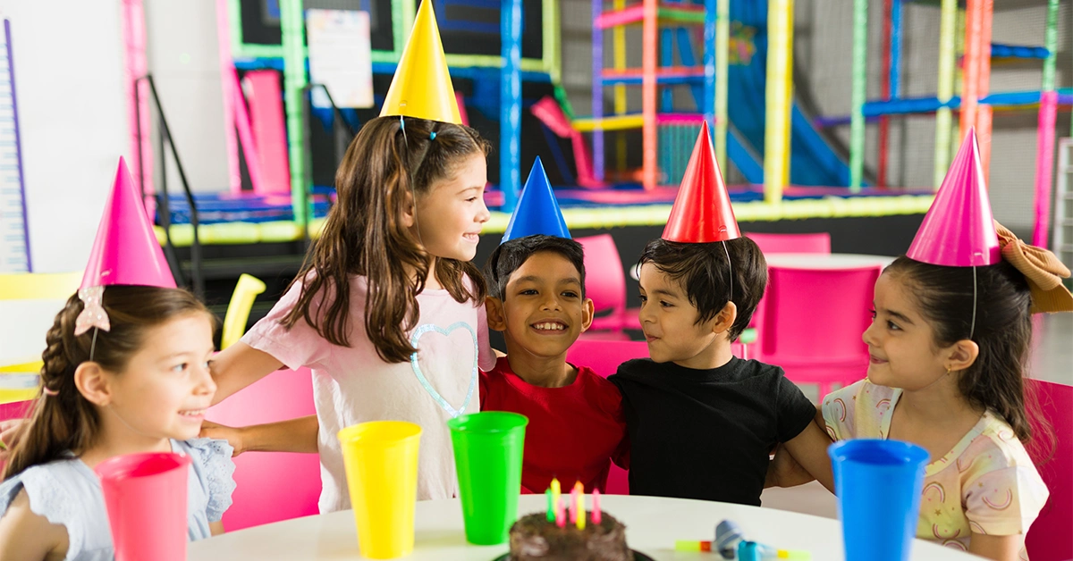 Group of kids celebrating a birthday at orange wheels