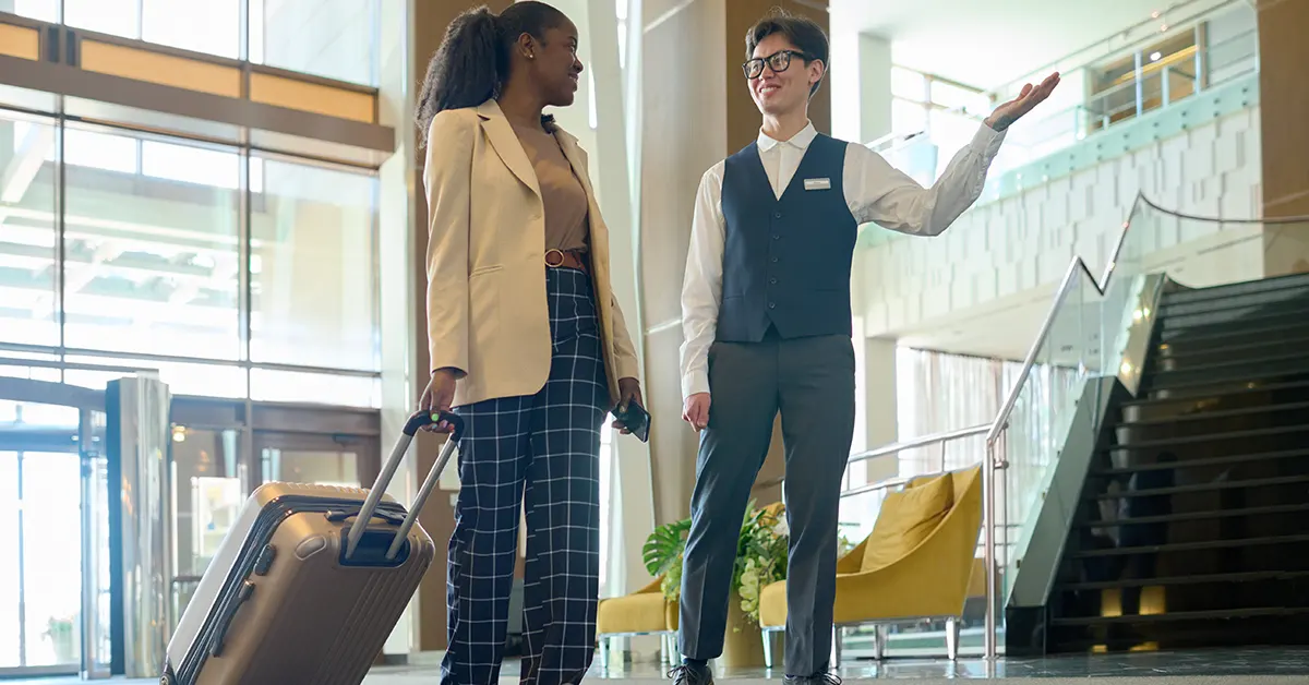 Guest Handing Over Her Luggage