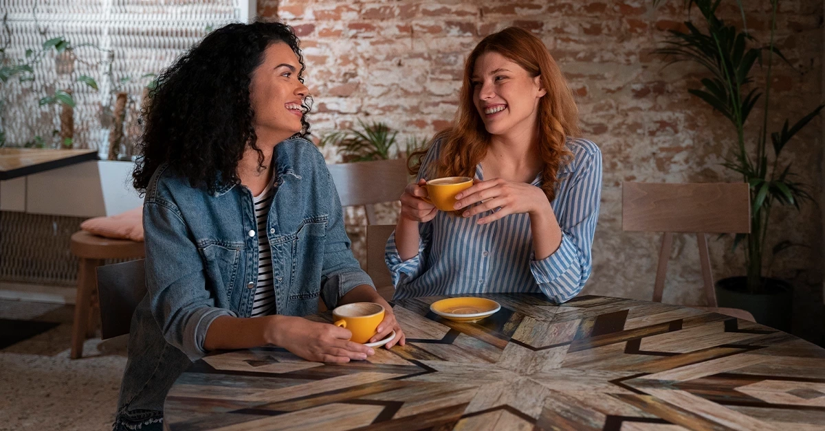A woman enjoying her time at a coffee shop