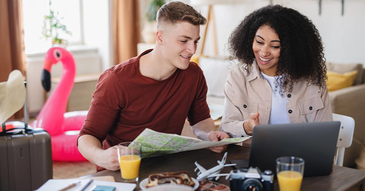 A young couple choosing the best insurance provider in the UAE 