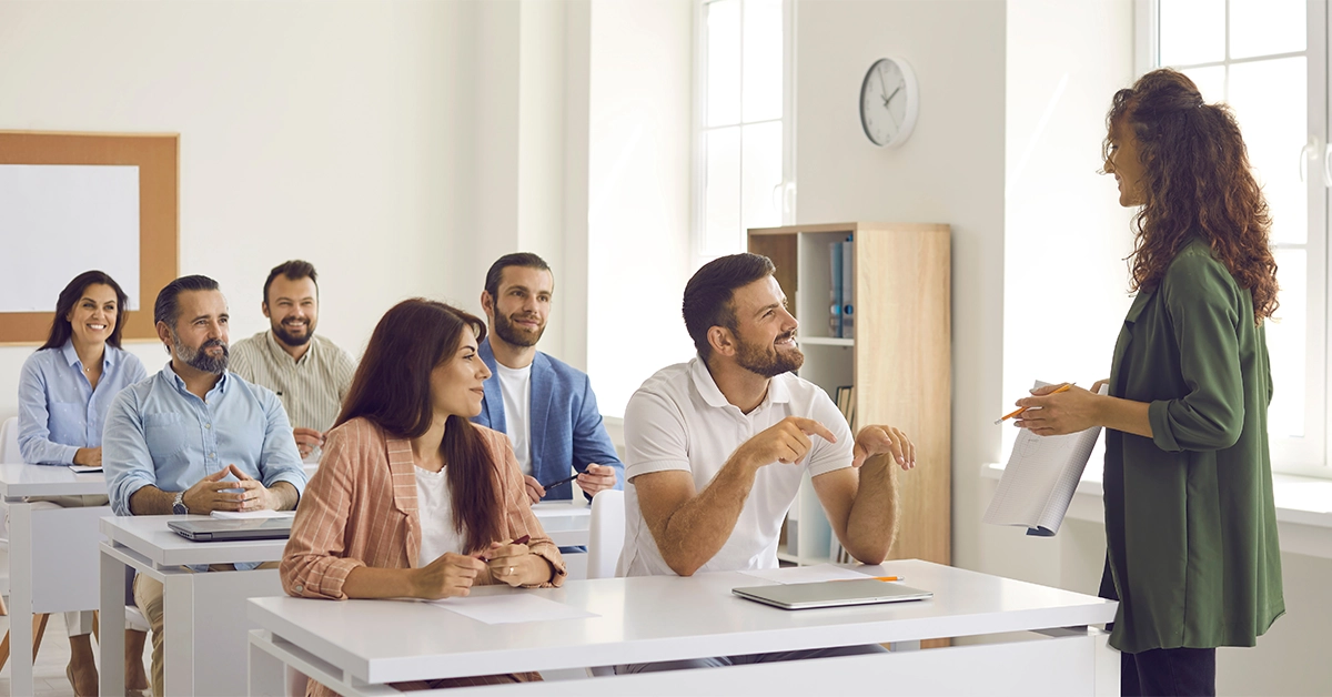 A business trainer delivering a lecture