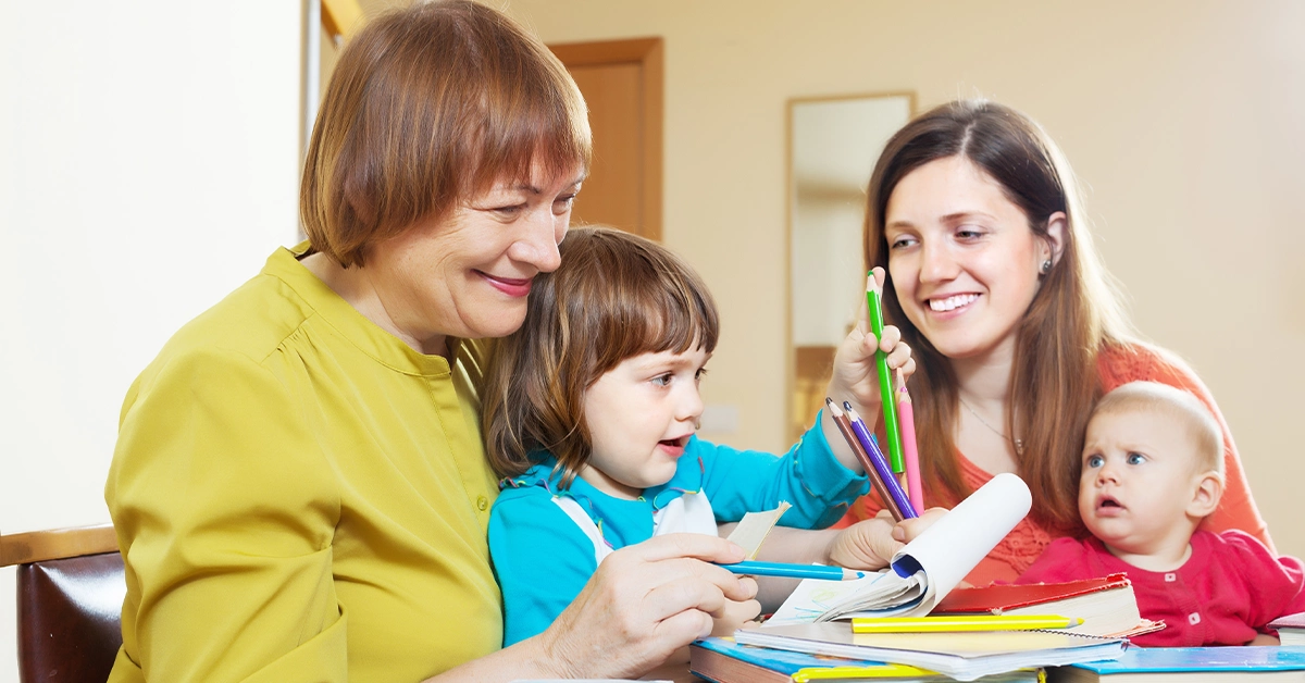 An experienced instructor teaching sketching to a child
