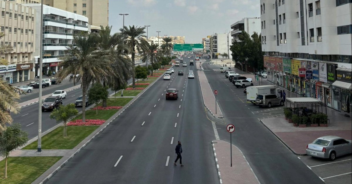 Road with cars and traffic signs