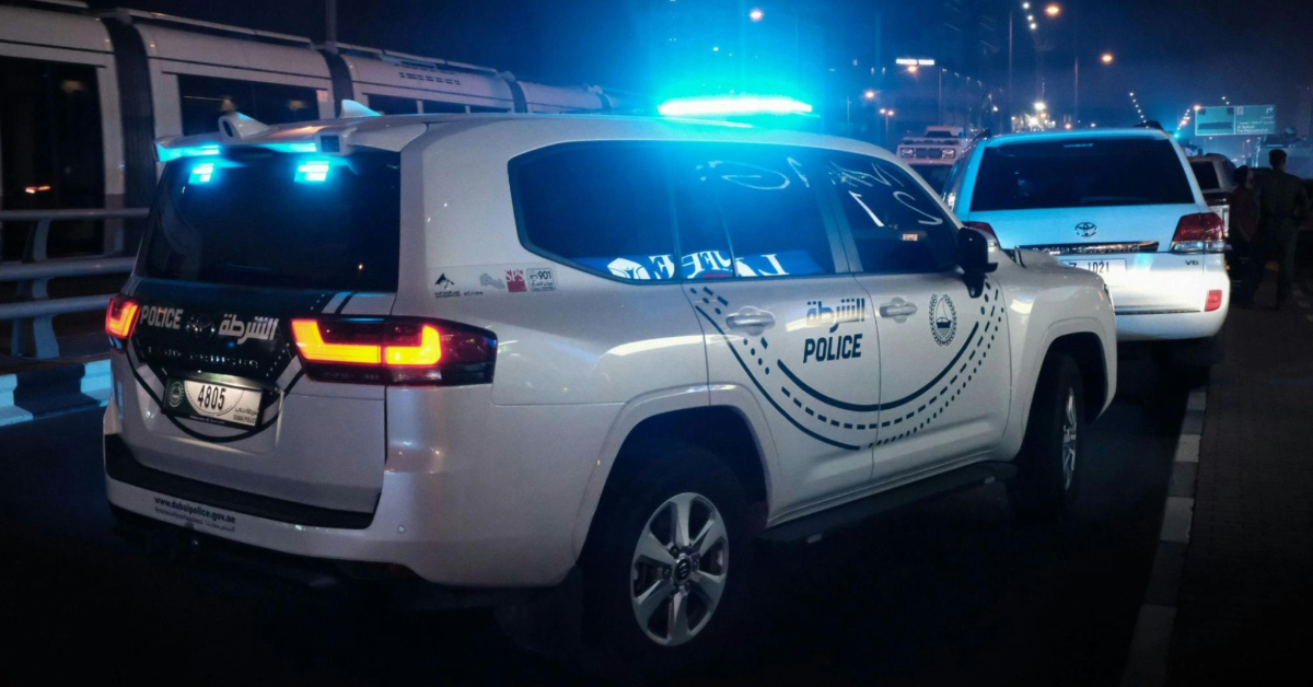 UAE police cars at night in Dubai 