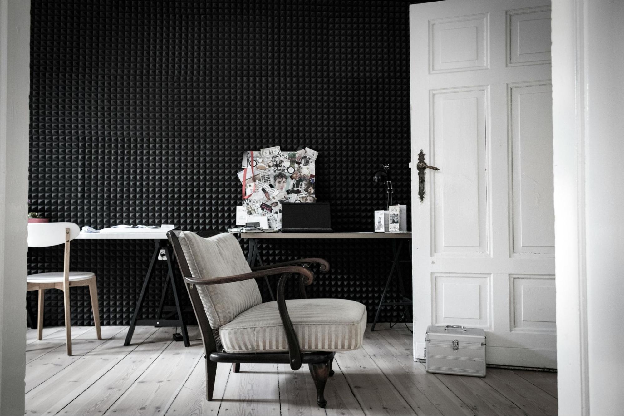 a room with chairs and soundproofing
