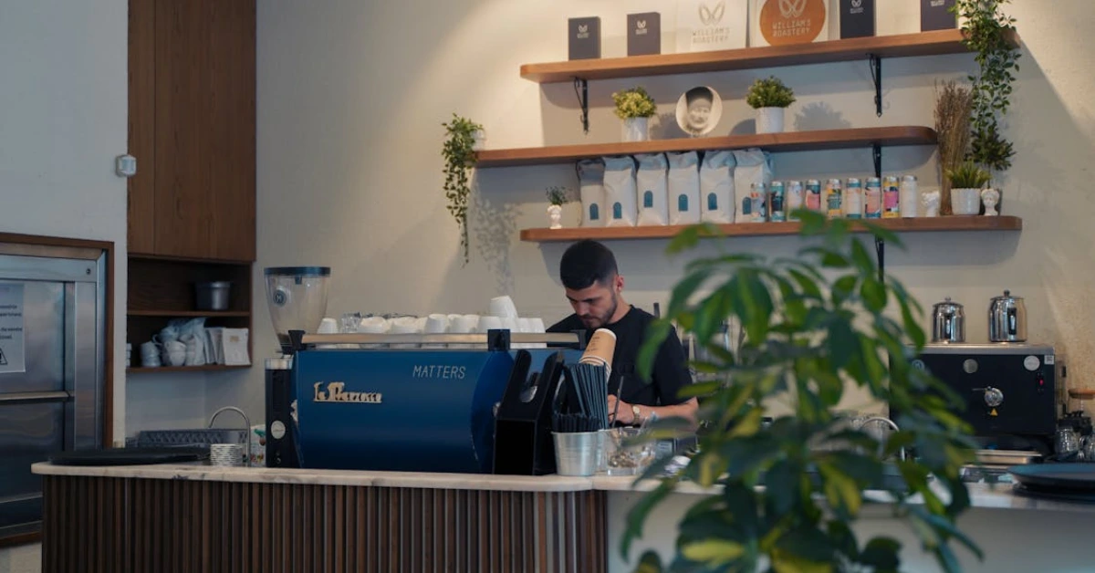 Man Working at Cafe