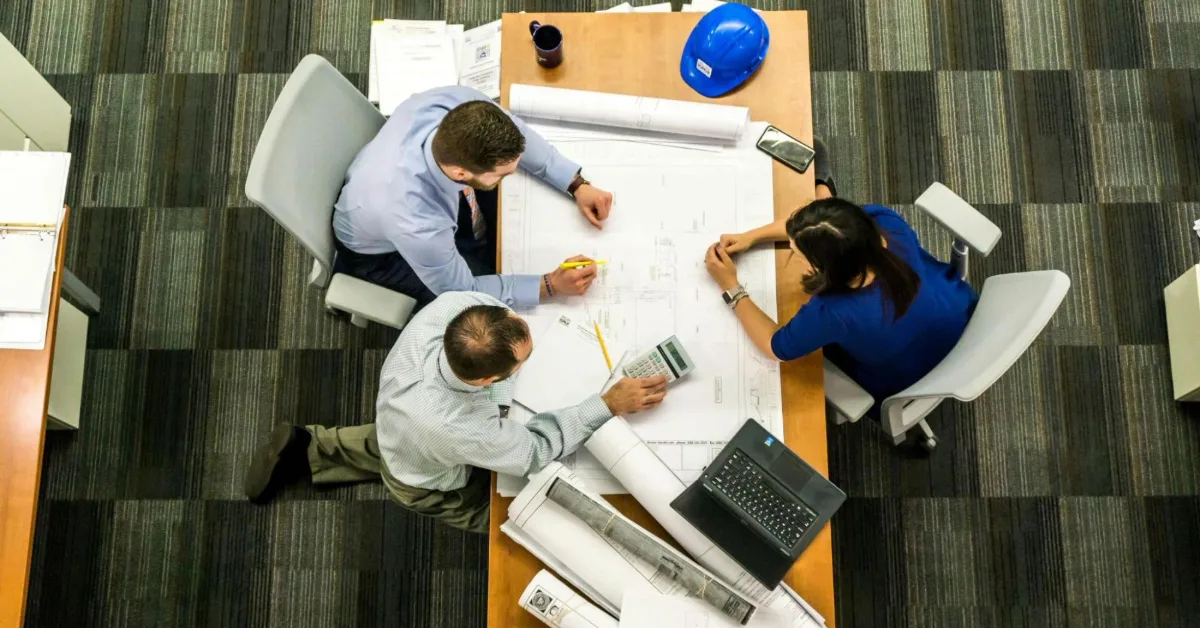 Engineers working on a renovation project drawing