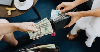 People Holding Money