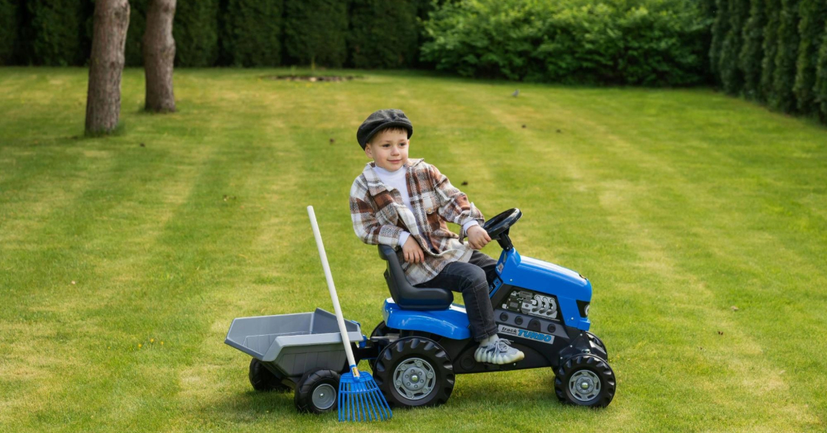 Child Playing on Toy Tractor in Gateway park