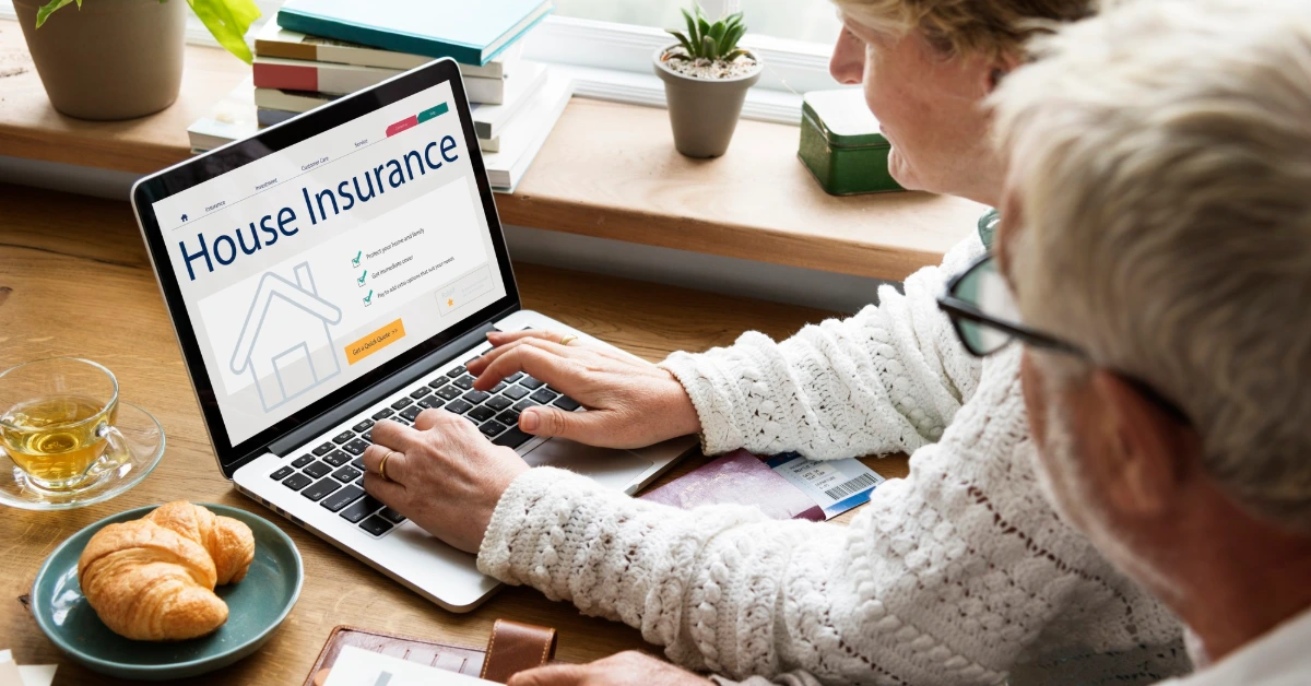 house insurance on the laptop