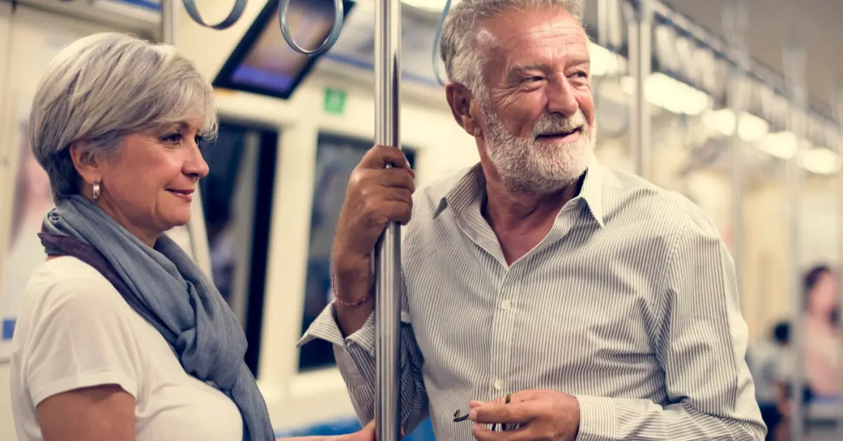 elderly couple on a metro
