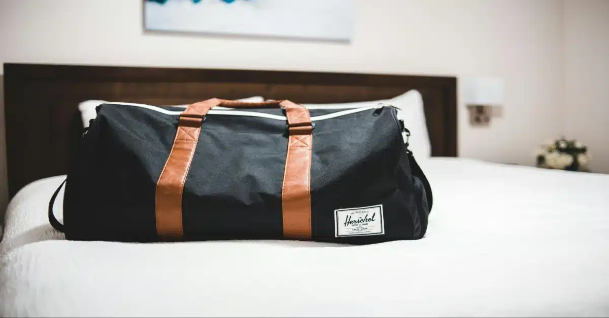 Luggage on a hotel bed